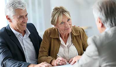Older couple meeting with estate planner